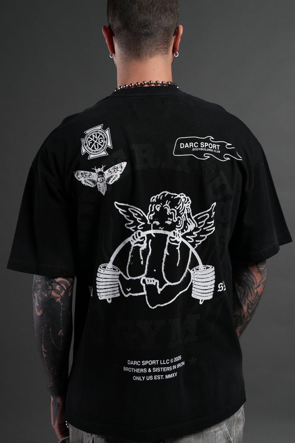 Powerhouse of the Cherub Unisex Premium Oversized Tee in Black Drift Wash — imagem 8