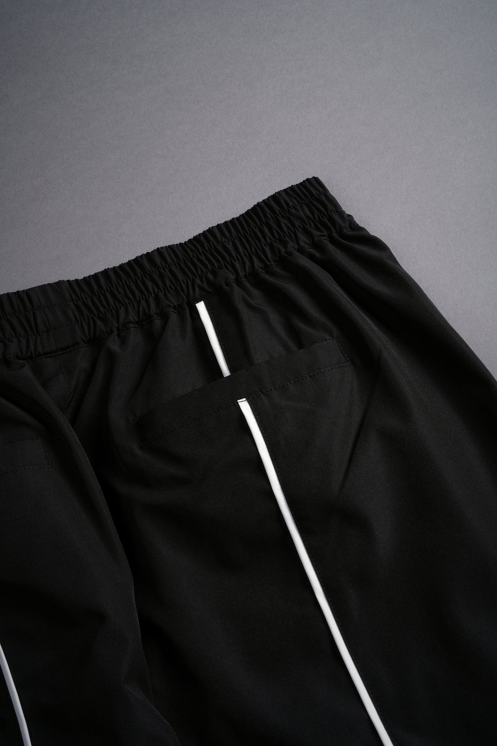 Dual Wolf Quinn Track Pants in Black/Sand — imagem 10