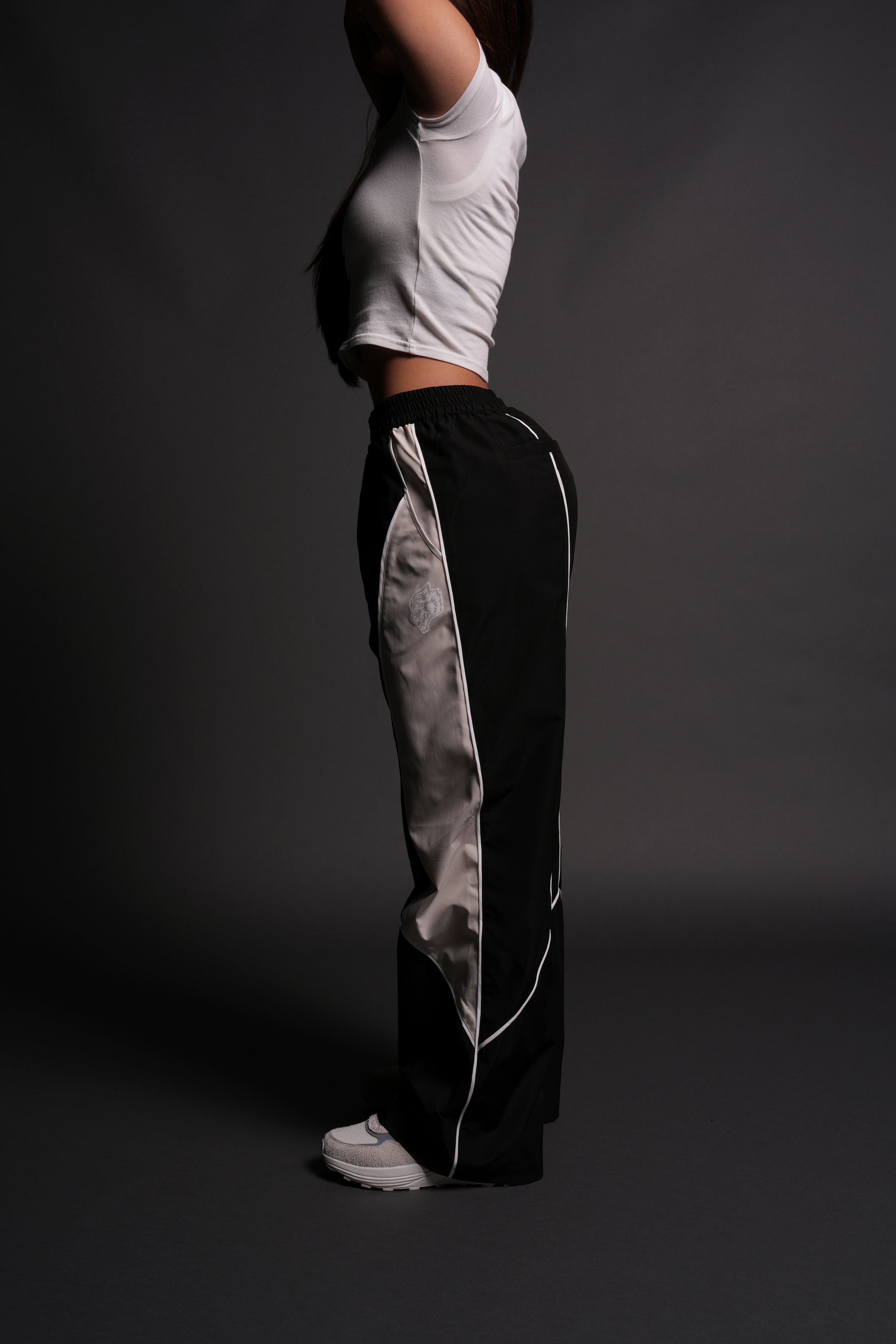 Dual Wolf Quinn Track Pants in Black/Sand — imagem 2