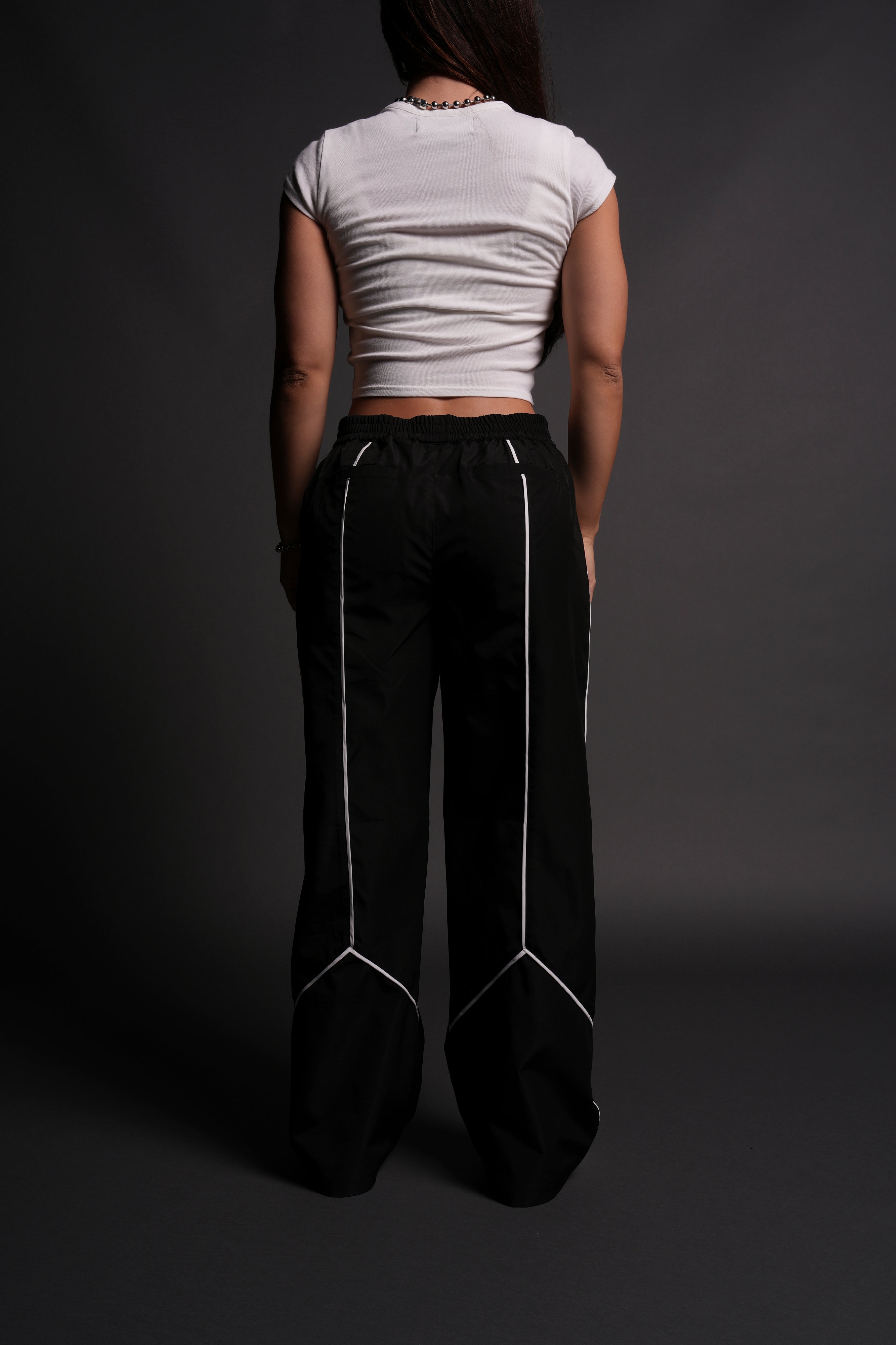 Dual Wolf Quinn Track Pants in Black/Sand — imagem 5