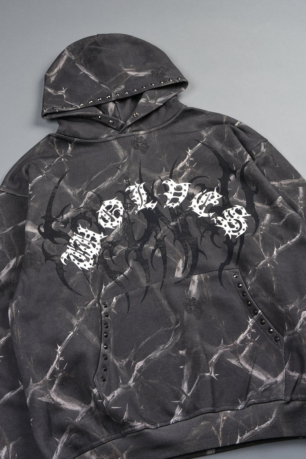 Studded Mantra Pierce Hoodie In Darc Thorns