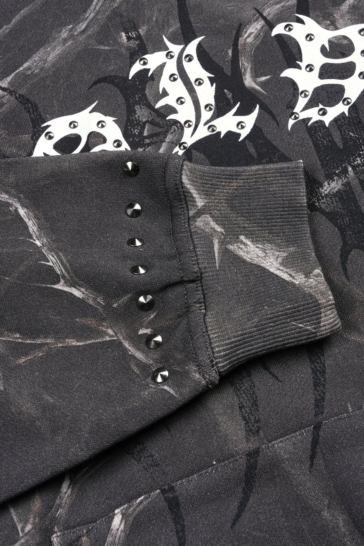 Studded Mantra Pierce Hoodie In Darc Thorns