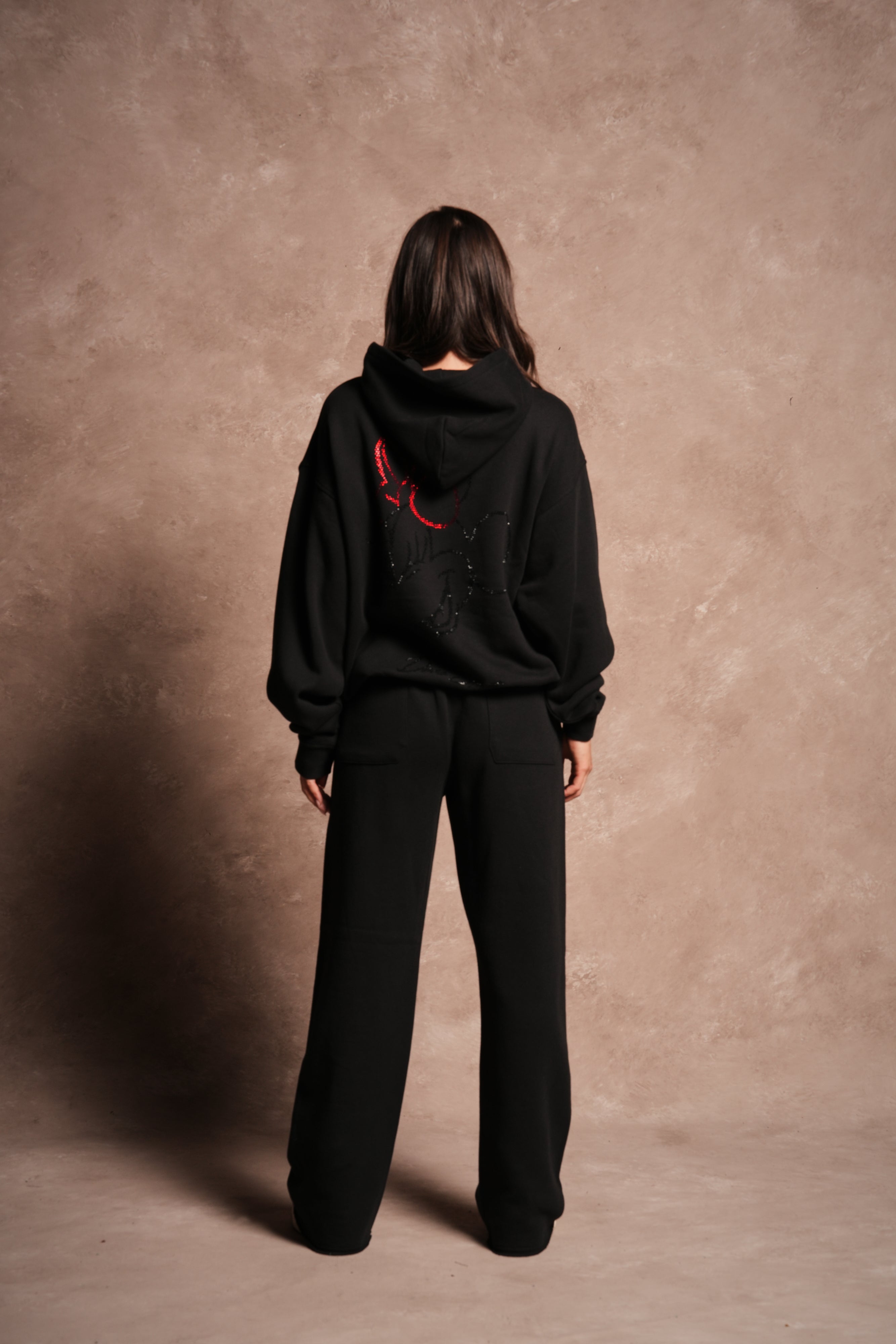 Watch Her Shine Pierce Hoodie in Black