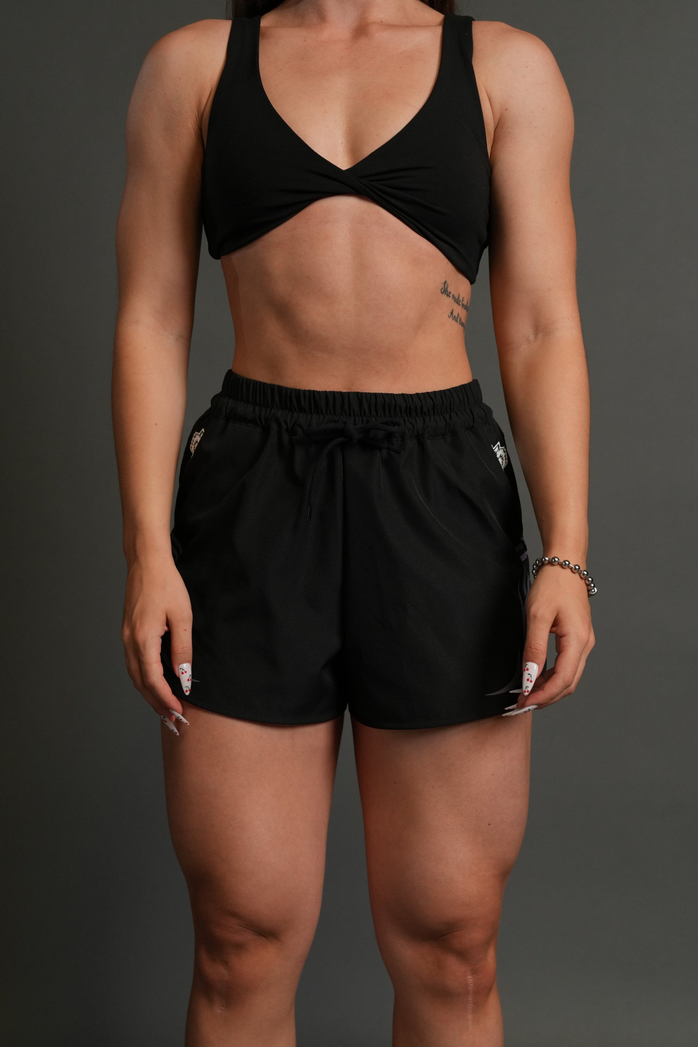 Dual Finite Code She Nadia Track Shorts in Black — imagem 1