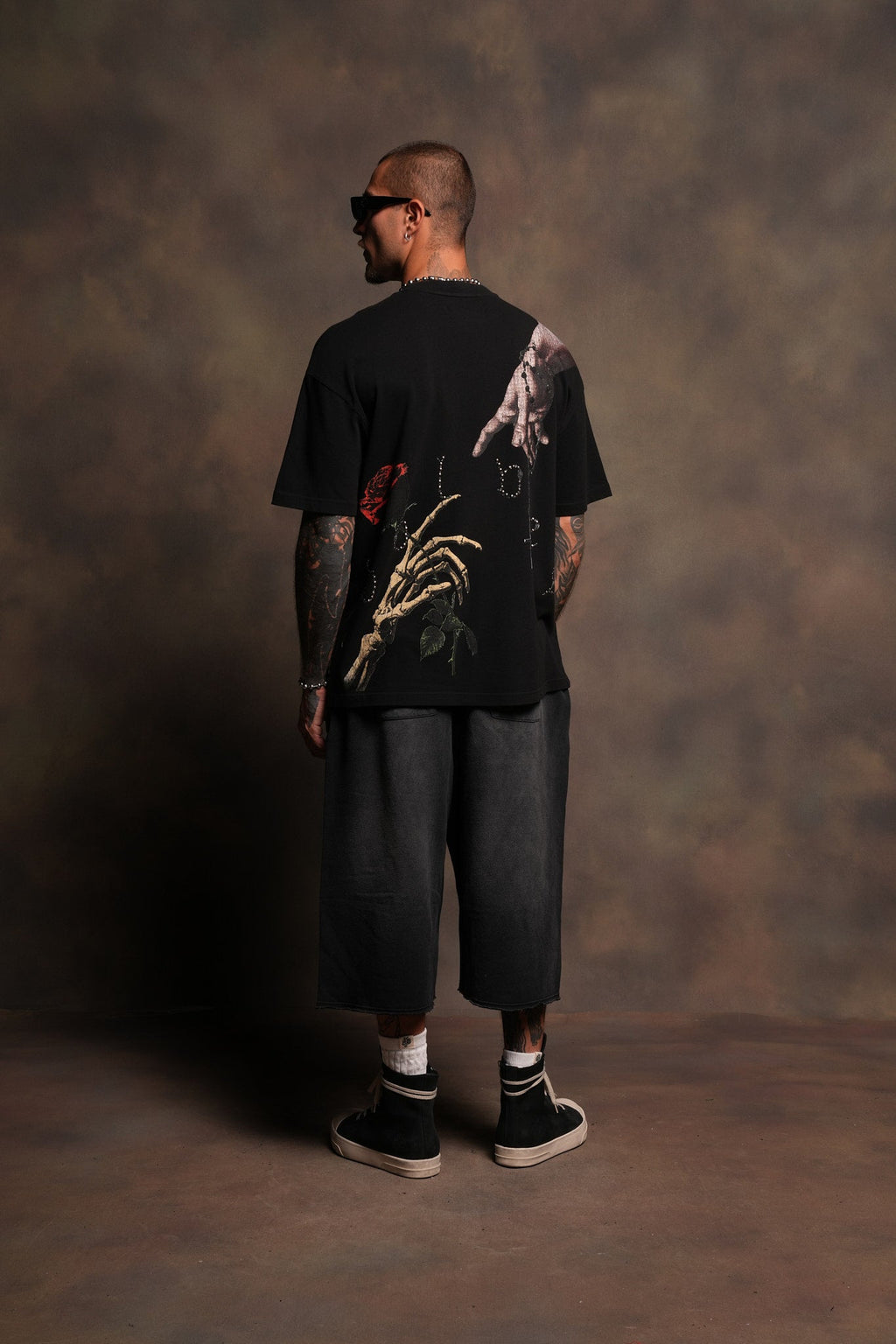 Hand That Holds Premium Oversized Tee In Black