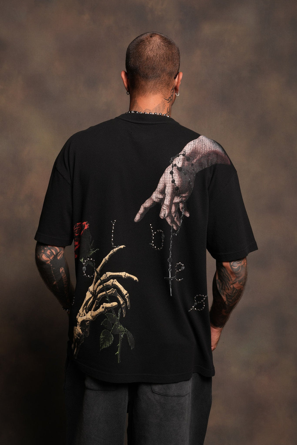 Hand That Holds Premium Oversized Tee In Black