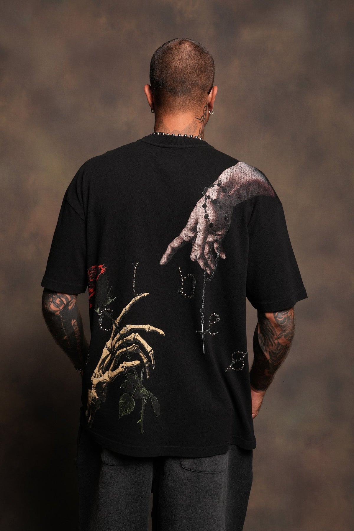 Hand That Holds Premium Oversized Tee In Black