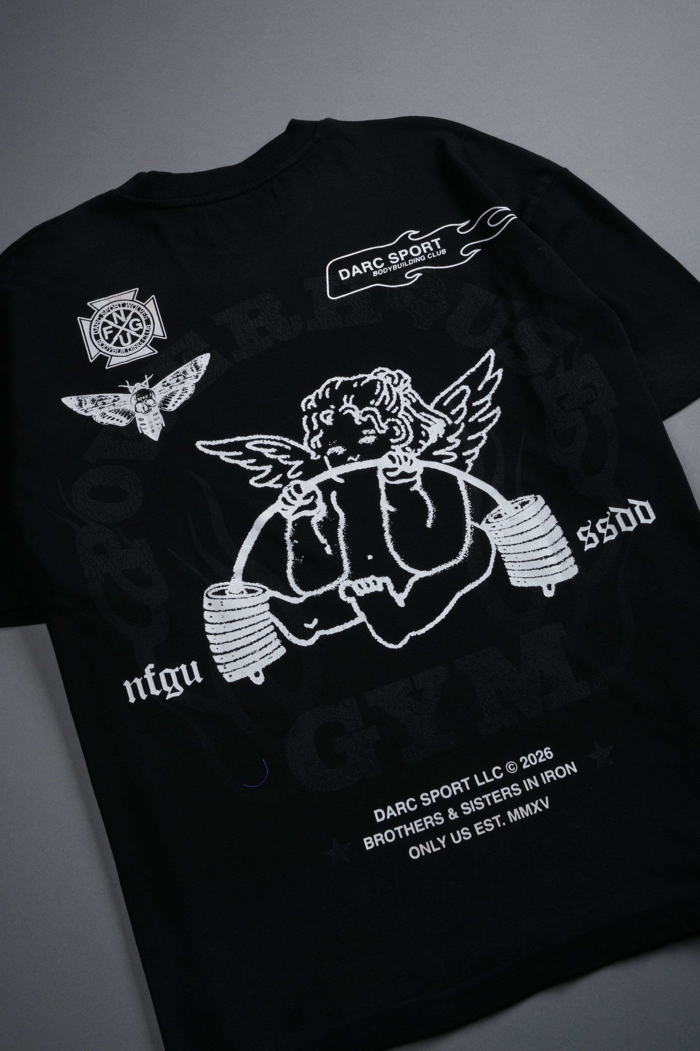 Powerhouse of the Cherub Unisex Premium Oversized Tee in Black Drift Wash — imagem 10