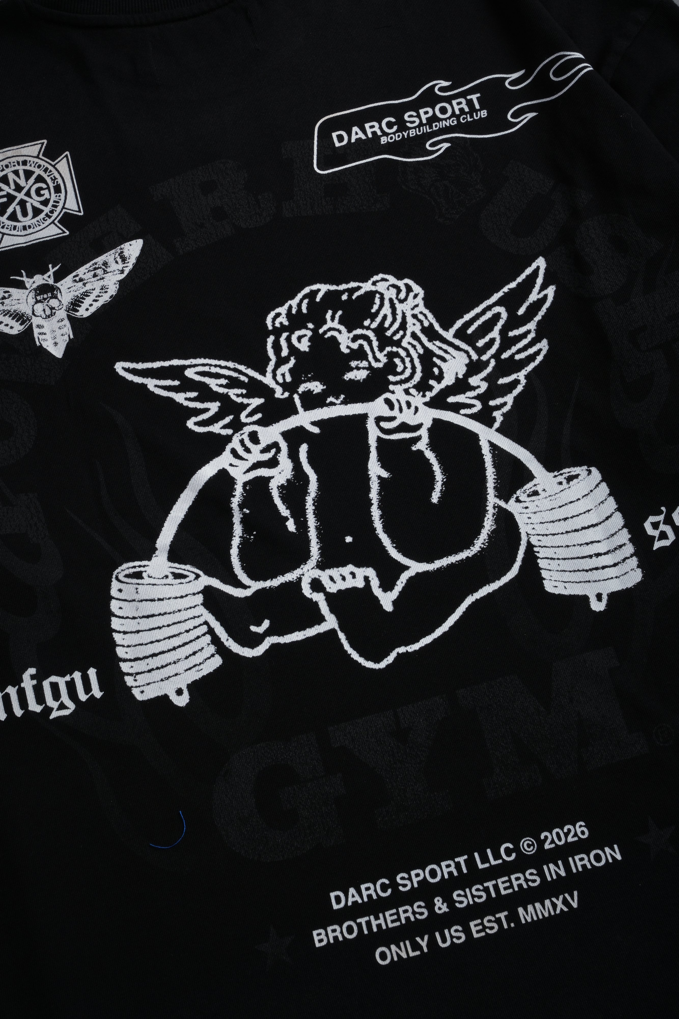 Powerhouse of the Cherub Unisex Premium Oversized Tee in Black Drift Wash — imagem 11