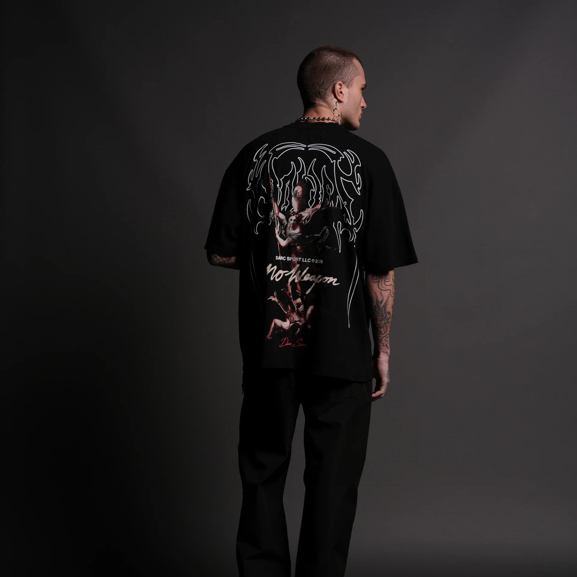 Camiseta Oversized Darc Sport No Weapon