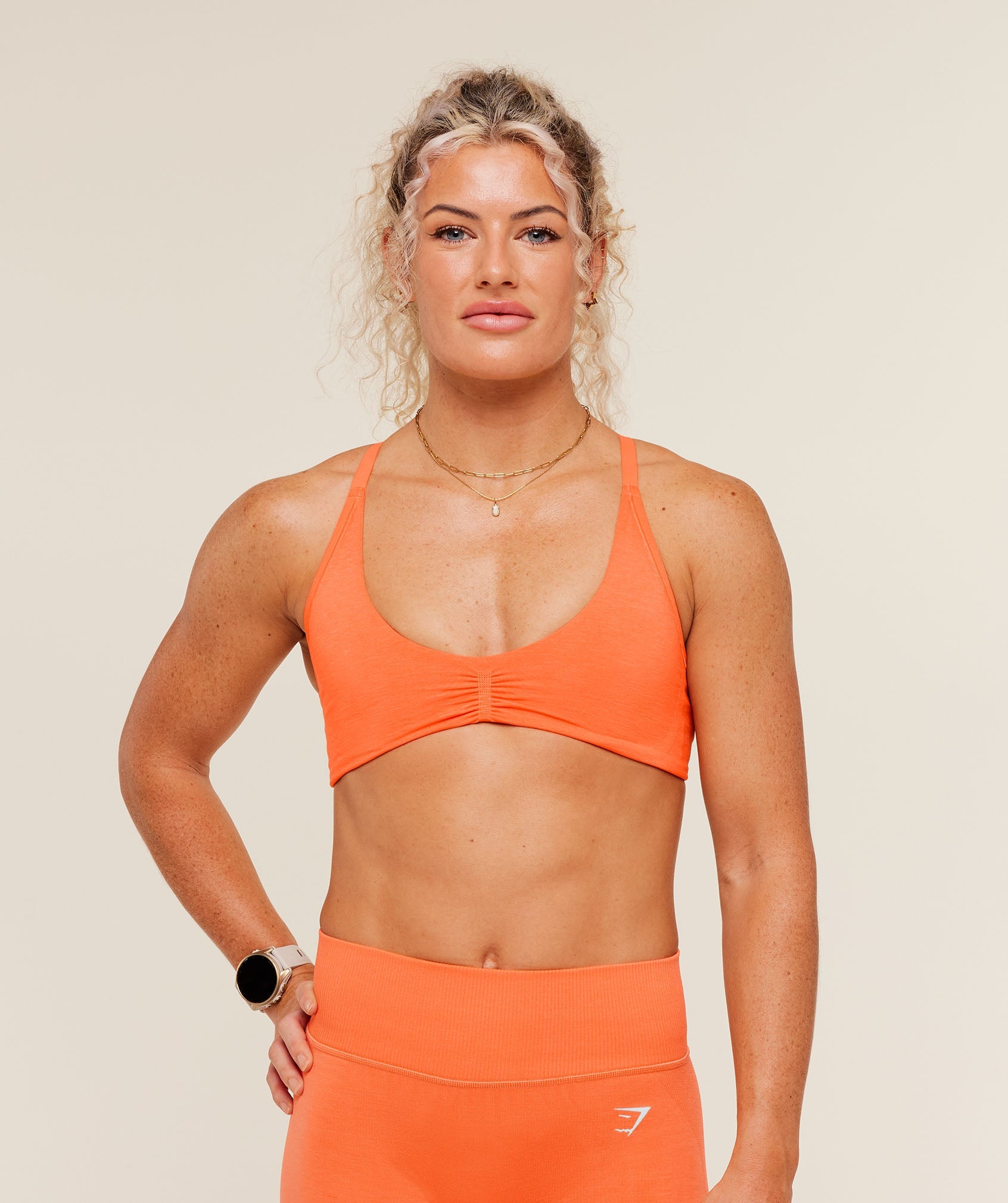 Interval Seamless Light Support Sports Bra - Dayglow Peach — imagem 1